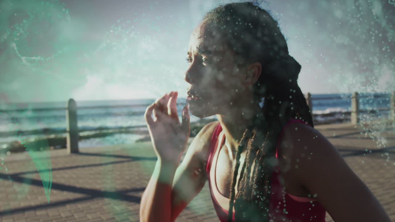 ondas digitales verdes contra la cansada mujer afroamericana en forma en el paseo marítimo