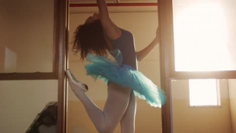 female dancer in an empty warehouse