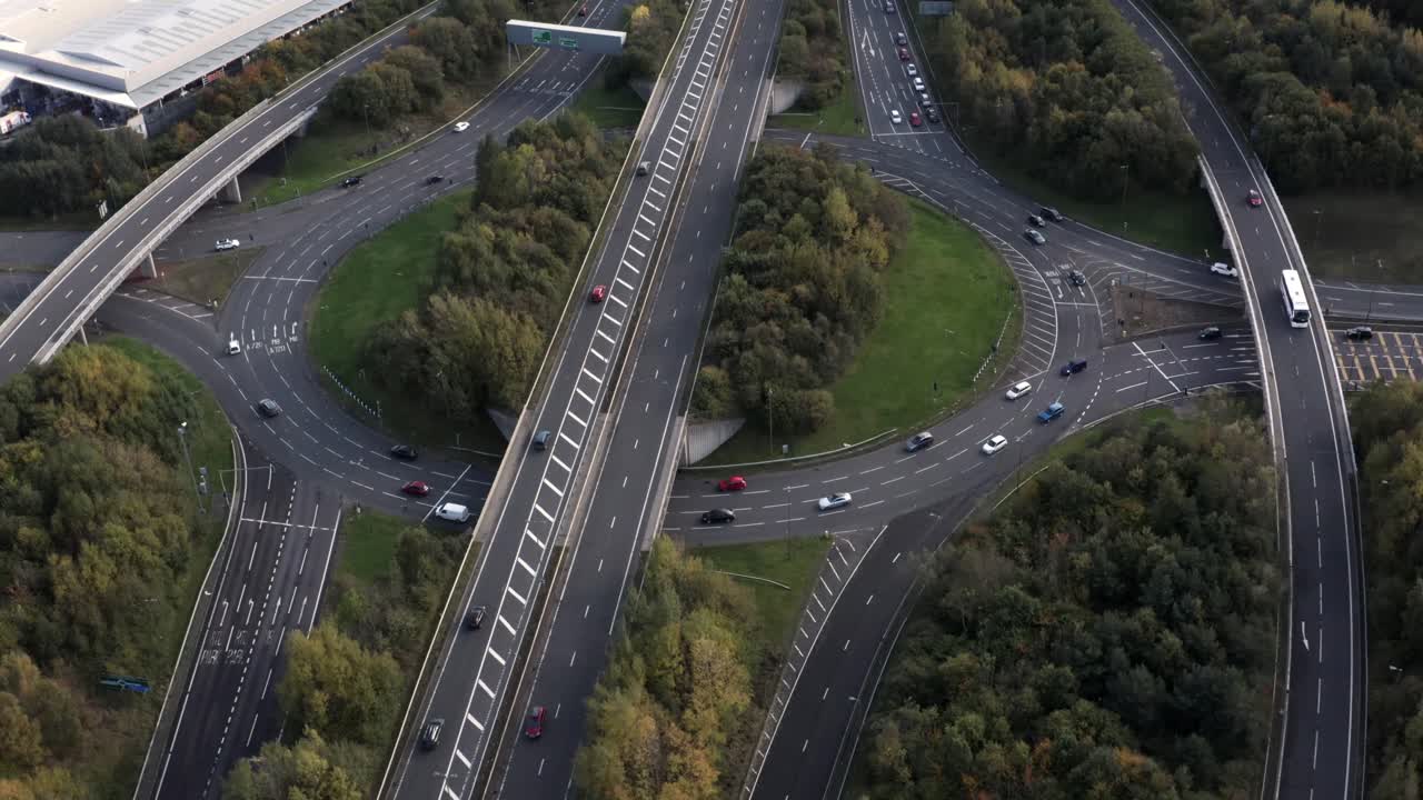 Helicopter police-chase style, bird's eye view of a busy ring road, fast cars overtaking  | Edinburgh, Scotland | 4K at 30fps