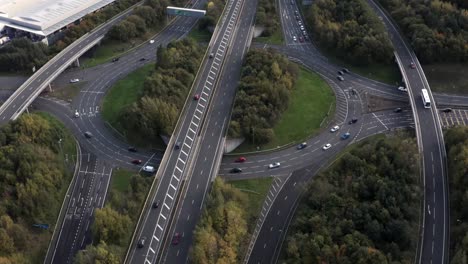 helicopter police-chase style, bird's eye view of a busy ring road, fast cars overtaking  | edinburgh, scotland | 4k at 30fps