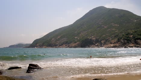 Choppy-waters,-incoming-tide,-Shek-O-Beach-location,-sunset-scenery