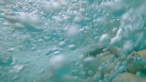 Children-relaxing-between-hot-tub-air-bubbles-massaging-their-bodies