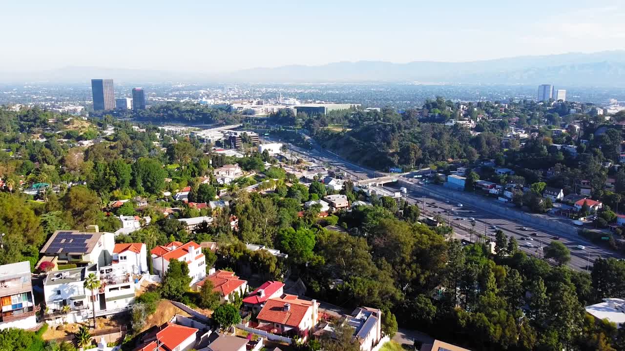 Hollywood Hills to Studio City. Birds-eye-view - panoramic. Day. 16 sec.