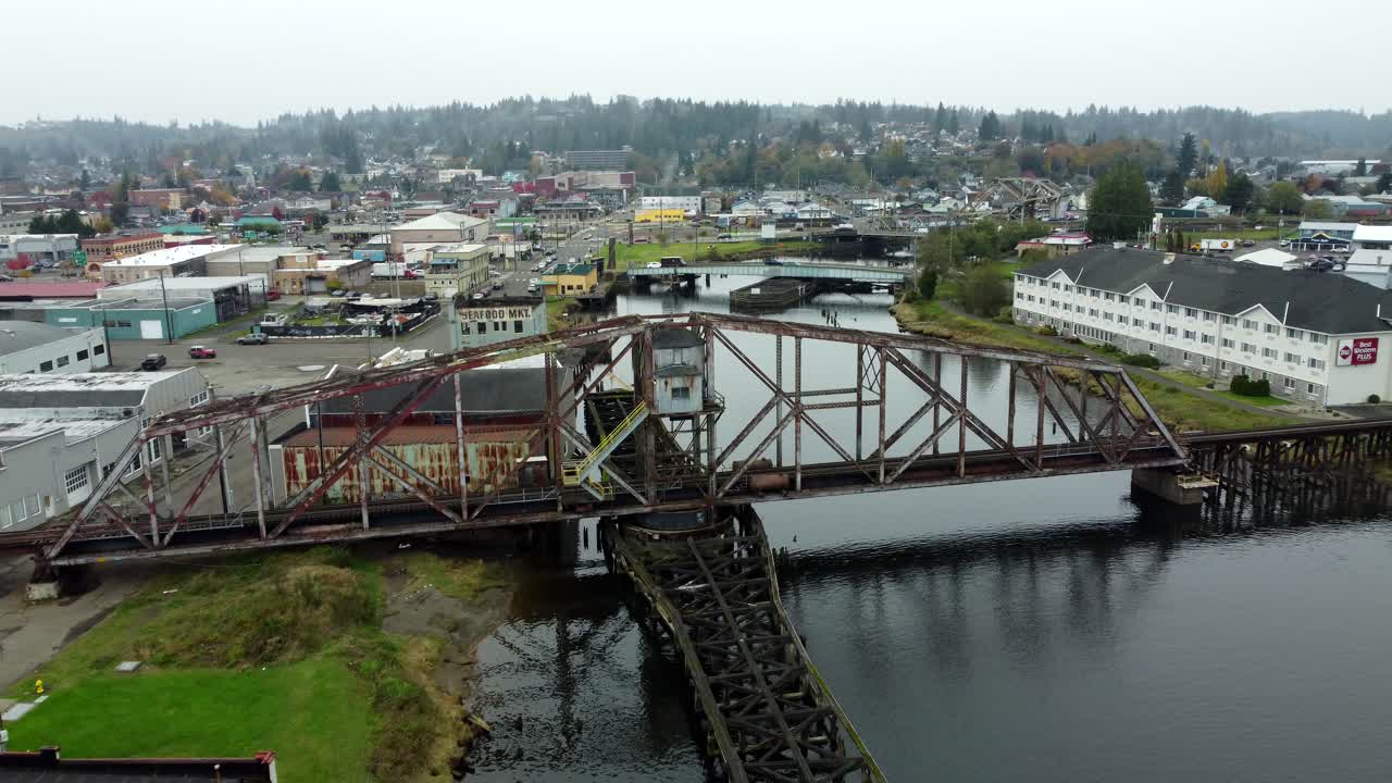 US, WA, Aberdeen, 2025-10-28 - Drone view of the Wishkah River Train Bridge