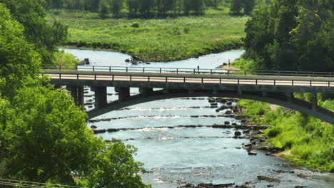 minnesota avenue bridge crossing zumbro river with rock arch branches to reduce erosion