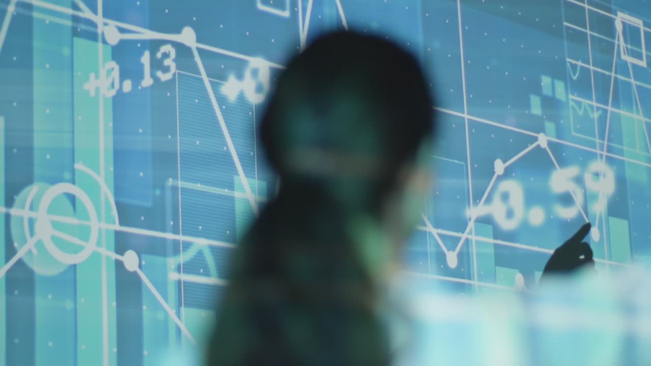 Woman Visiting Immersive Art Exhibition With Projection Of Financial Data With Graphs And Share Prices 6