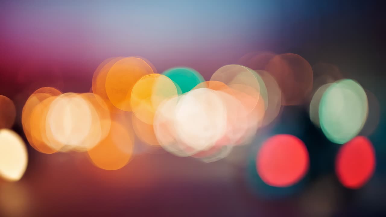 Displaying static overlapping bokeh light circles across left and right halves on dark backdrop