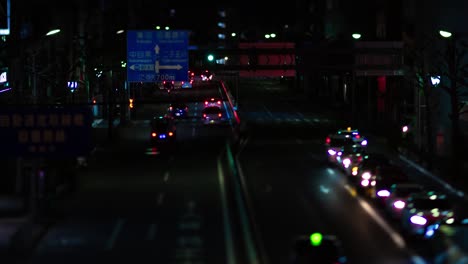 a night timelapse of the miniature traffic jam at the city street in tokyo