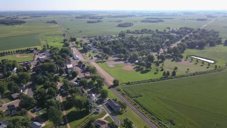 Flying-over-small-town-in-summer