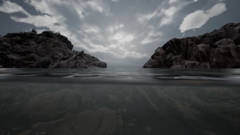 Medio-Bajo-El-Agua-En-El-Mar-Del-Norte-Con-Rocas