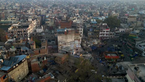 drone shot shanty town and slums in suburbs of large city in india