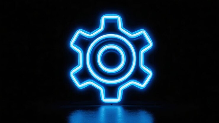 Un'icona di ingranaggio al neon luminosa e illuminata su uno sfondo scuro, che rappresenta concetti di tecnologia, ingegneria e meccanica in un formato visivo moderno