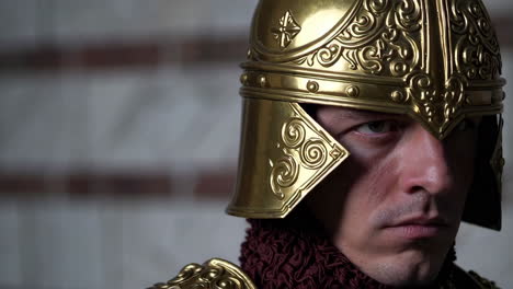 portrait of a man in medieval gold armor