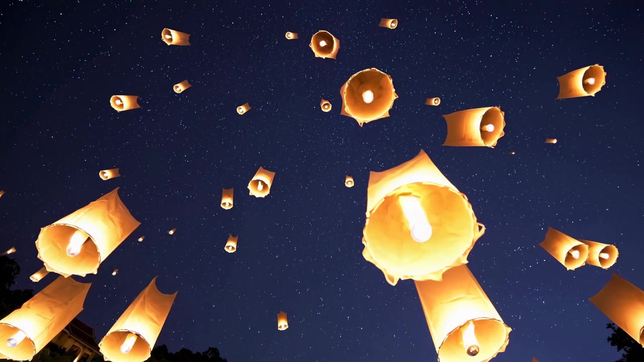 Sky Lanterns Floating Into the Night Sky