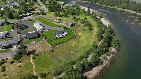 Wide-orbiting-aerial-shot-of-the-million-dollar-properties-bordering-the-Spokane-River