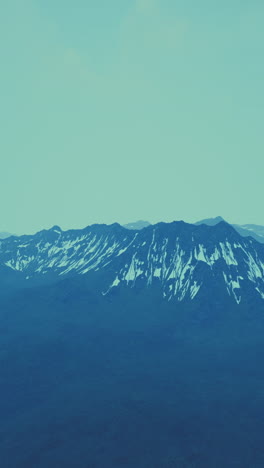 majestic mountain range with snow-covered peaks