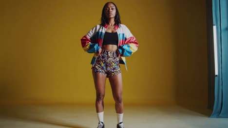 trendy woman in colorful retro outfit