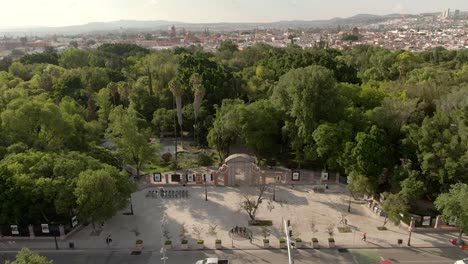 aerial of plaza de la familia at alameda hidalgo park in downtown of santiago de queretaro, mexico