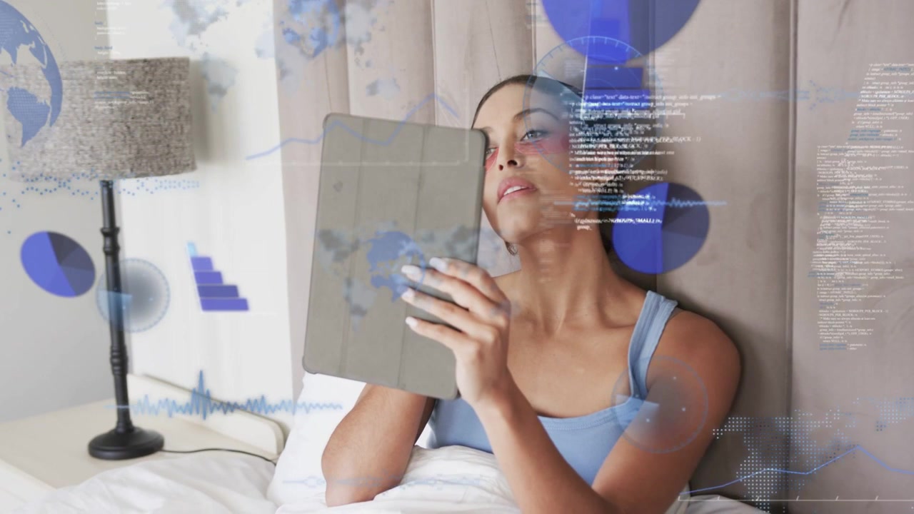 Woman holding tablet in bed, app launching HUD charts overlapping then easing, analyzing tech data