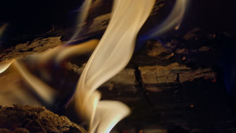 Slow-motion-shot-of-flames-and-embers-in-a-fireplace