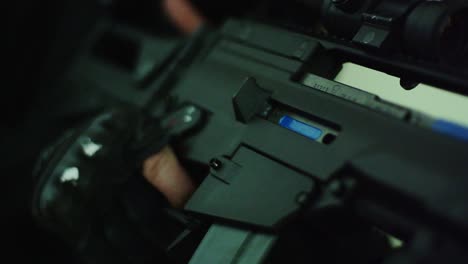 slow motion close up, blank round fired by elite soldier in tactical simulation