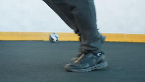 close up of legs in motion as athlete jogs on sport arena in athletic shoes, emphasizing dynamic movement, fitness, and energy with yellow boundary and urban backdrop