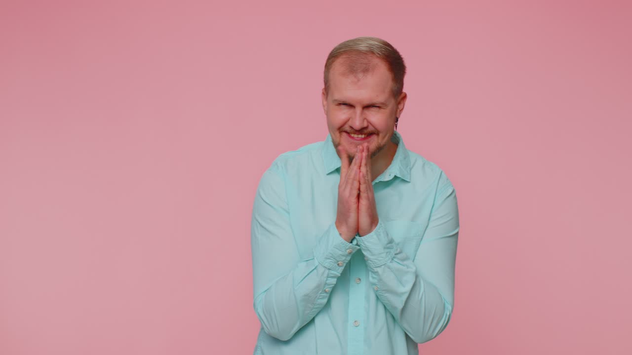 Sneaky cunning man with tricky face scheming evil plan thinking over villain idea jokes pranks