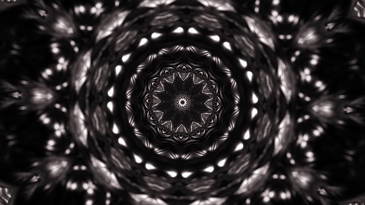 Foto hitam putih objek melingkar dengan desain melingkar. Loop VJ Kaleidoskop