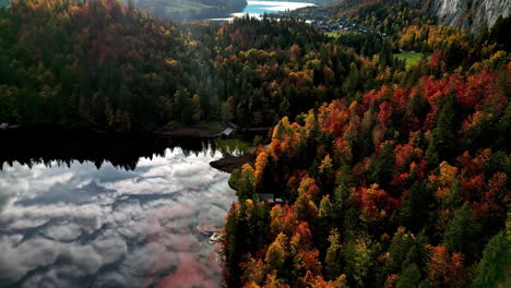 Aerial-view-of-Lake-Toplitz-with-forest-in-autumn-colors,-Austria