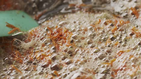 closeup of edible flowers cooking