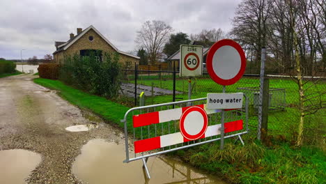 closed road due to water climate change crisis with high water flooding