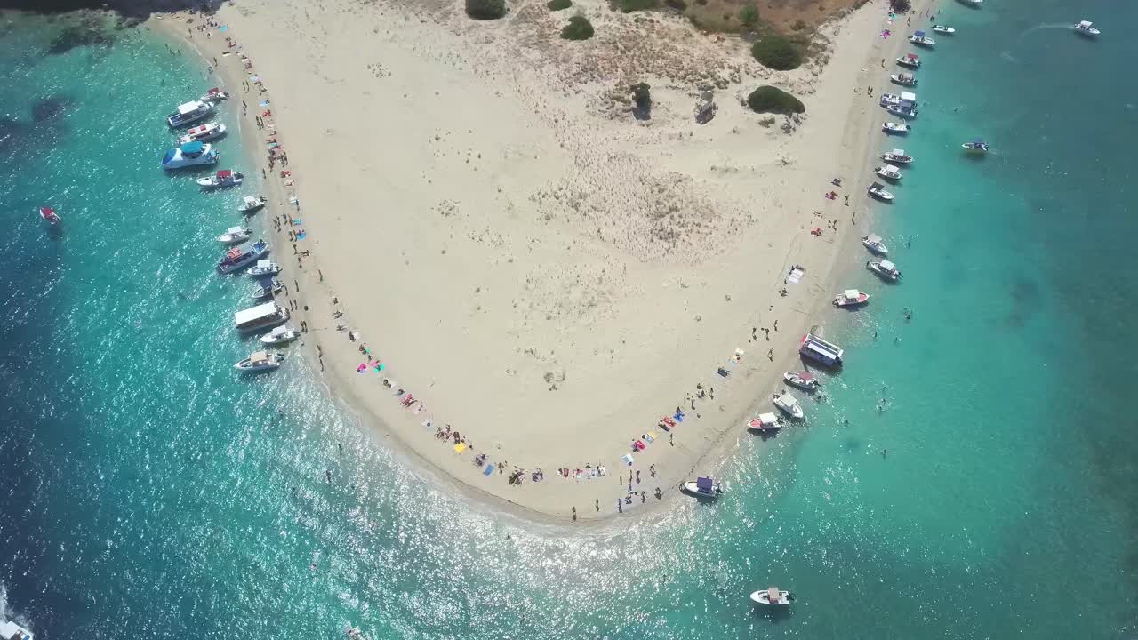 Aerial view to the popular beach of Marathonisi or Turtle island in the bay of Laganas, Zakynthos, Greece