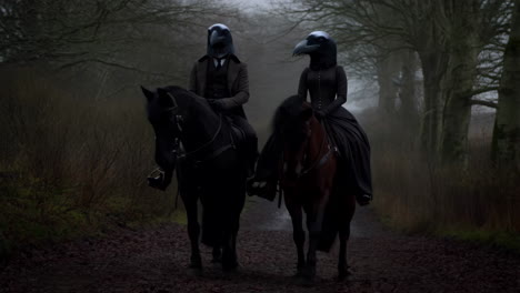 mysterious crow-headed riders on horseback in a misty forest