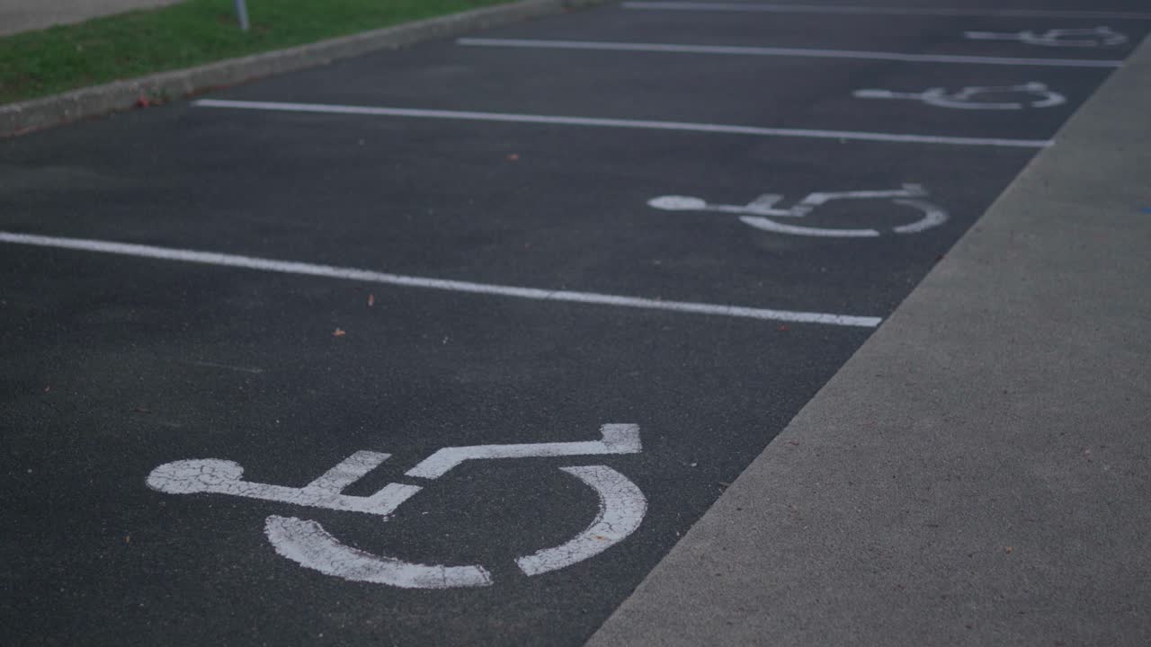 Parking spaces allocated for wheel chair users and disabled drivers