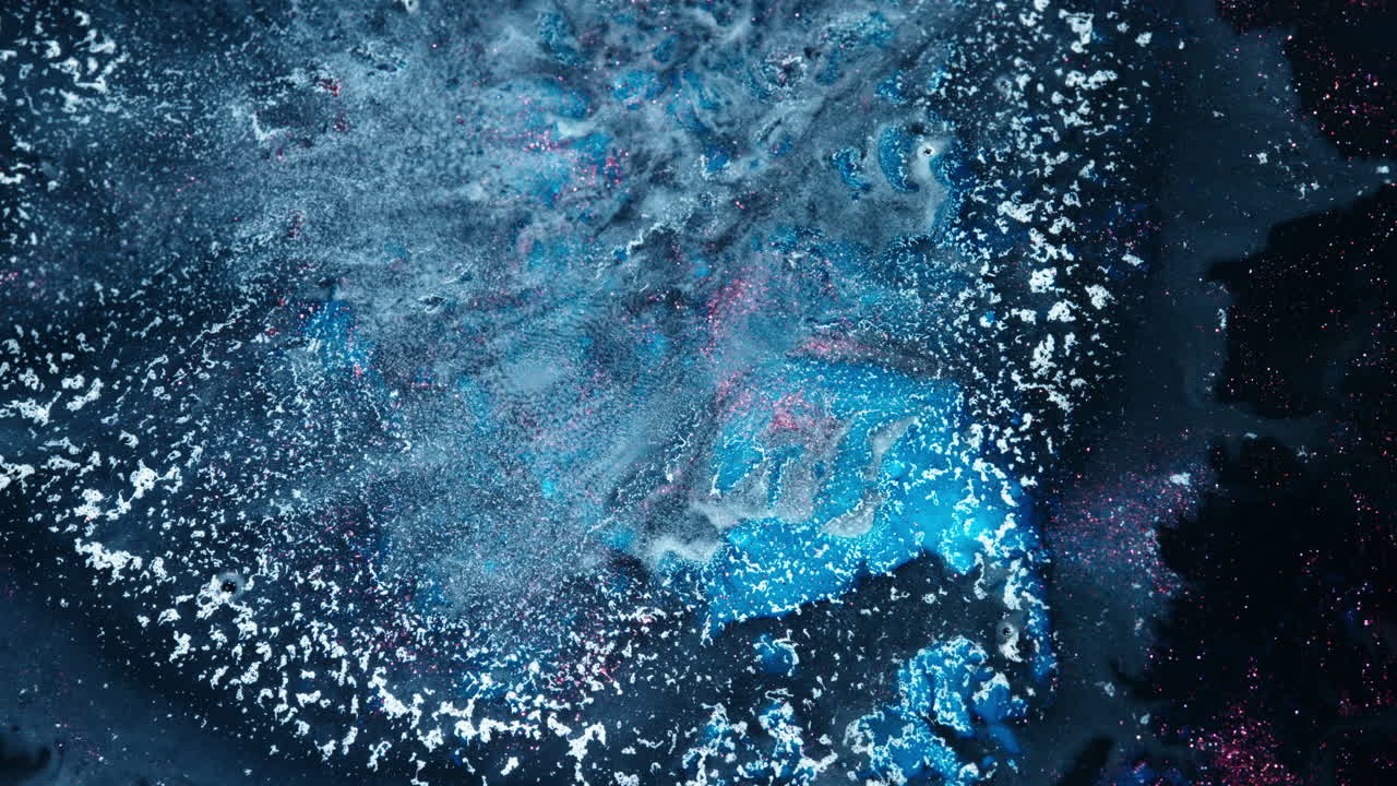 Abstract macro shot of substance dissolving in liquid creating swirls