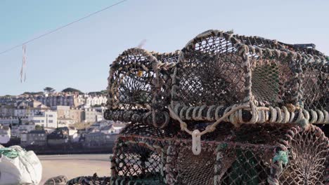 traditional fishing baskets by the beach of st ives, england -wide