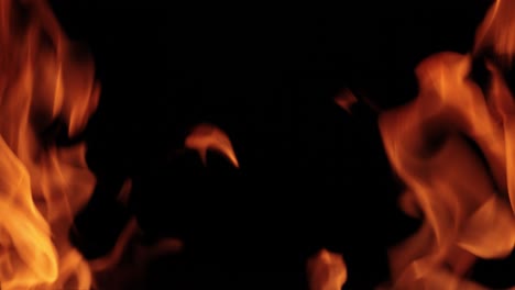 Flames-of-fire-on-black-background-in-slow-motion