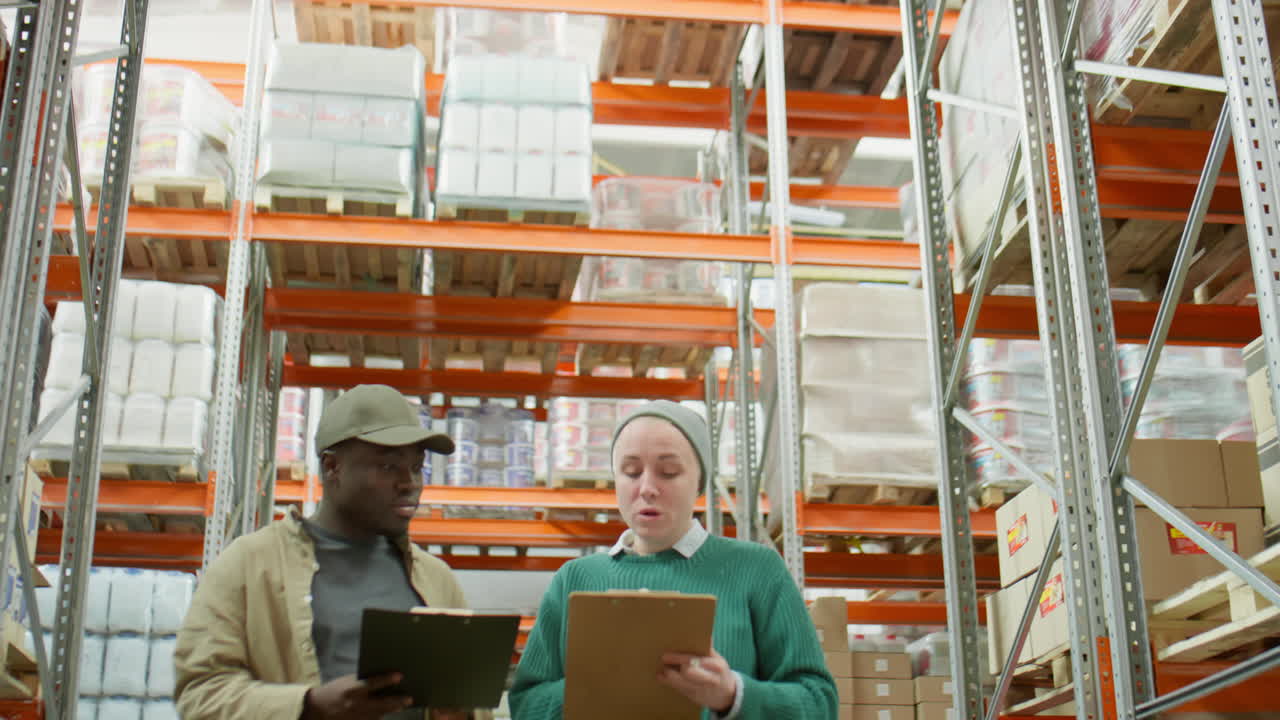 Warehouse workers conducting inventory check