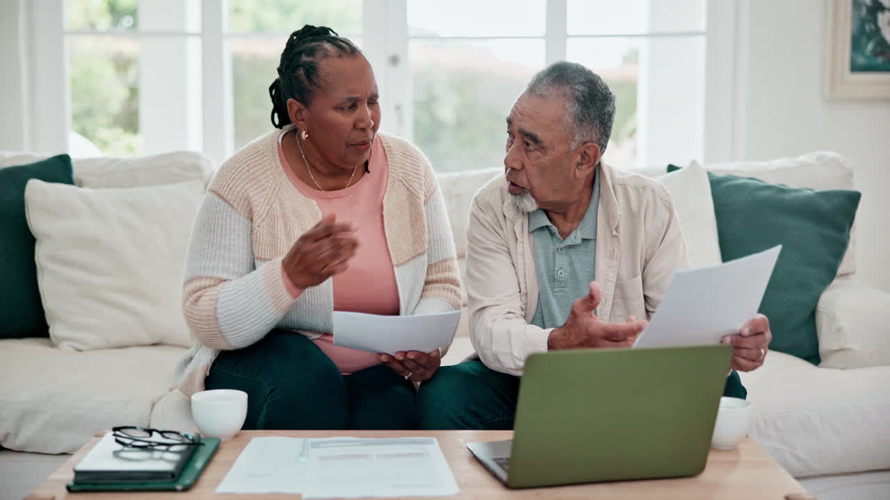 Old couple, laptop and life insurance paperwork