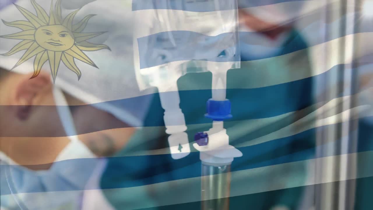 animación de la bandera de uruguay ondeando sobre los cirujanos en la sala de operaciones