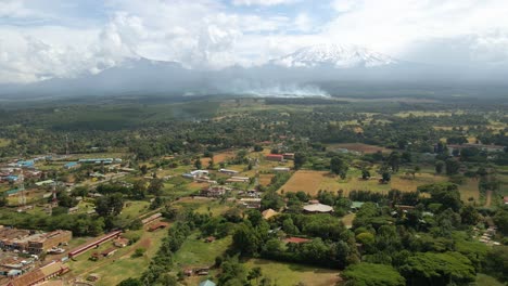 wildfire in the forests and fields of africa, danger to the village aerial drone