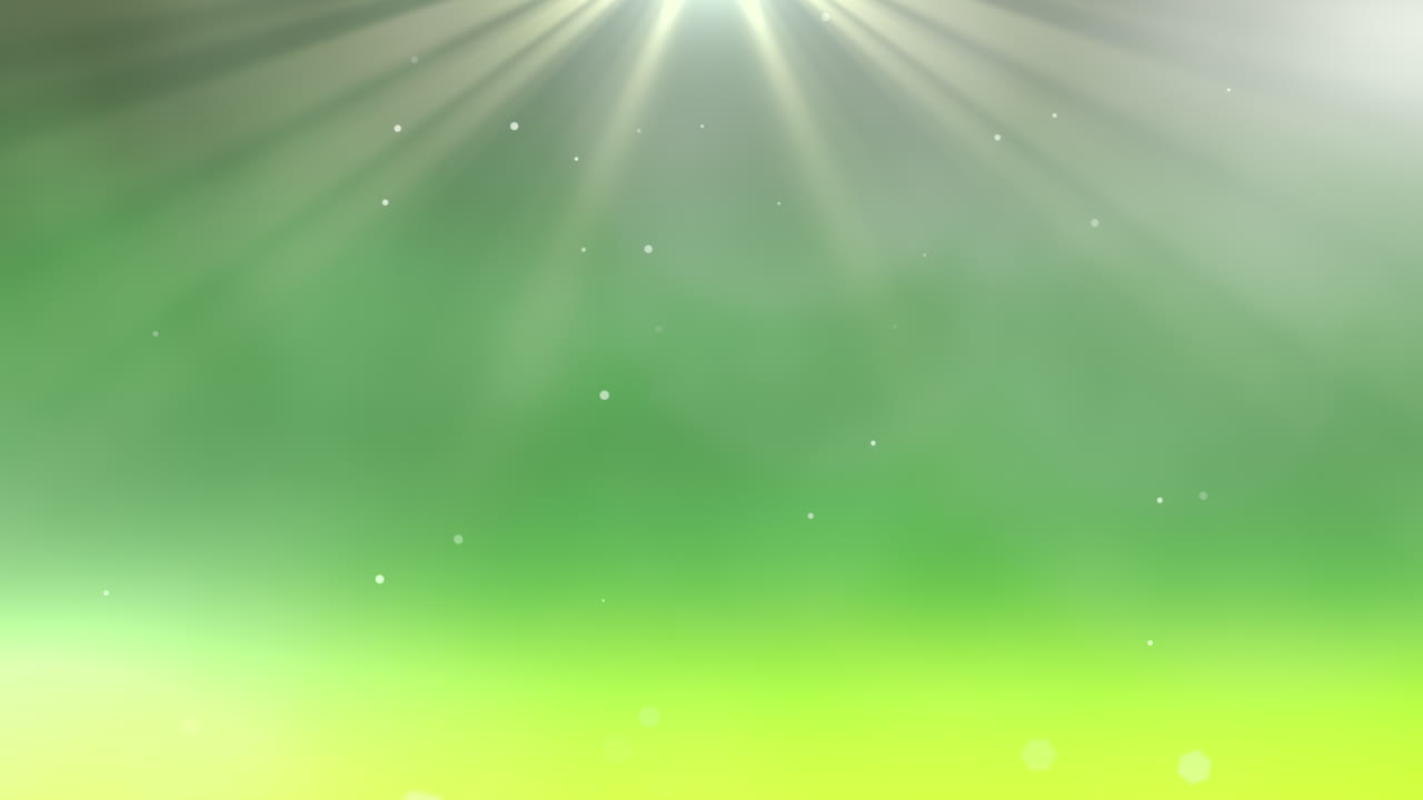Motion beams and fly abstract particles with round bokeh on green ...