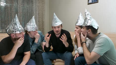 friends wearing foil hats