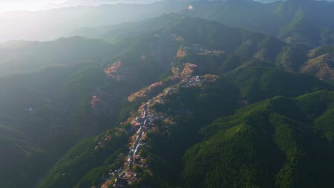 aerial drone establishing fly mount yoshino in japanese mountains, nara travel destination during cherry blossom spring world heritage