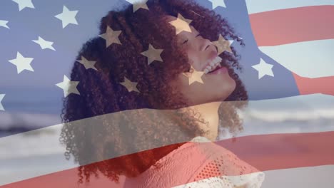 animation of flag of usa over happy biracial woman