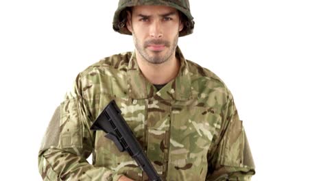 soldier standing with rifle on white background