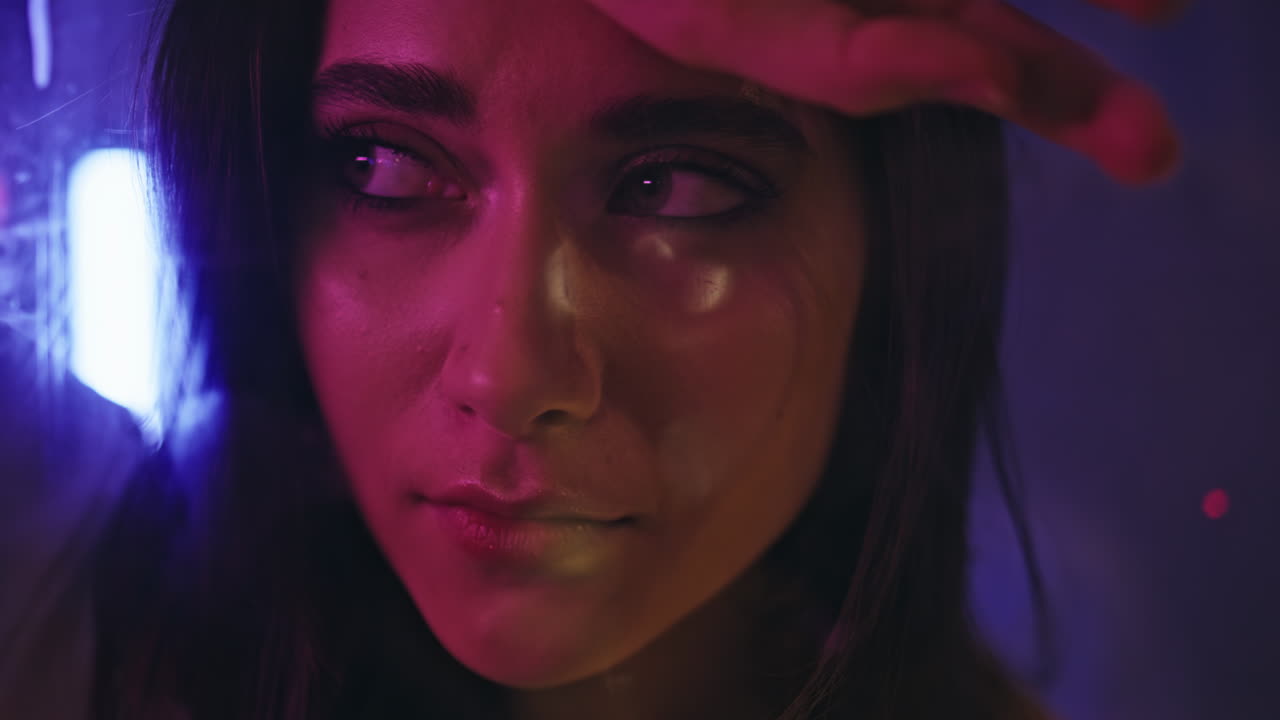 Sad lady calling neon light place portrait. Depressed upset woman looking camera