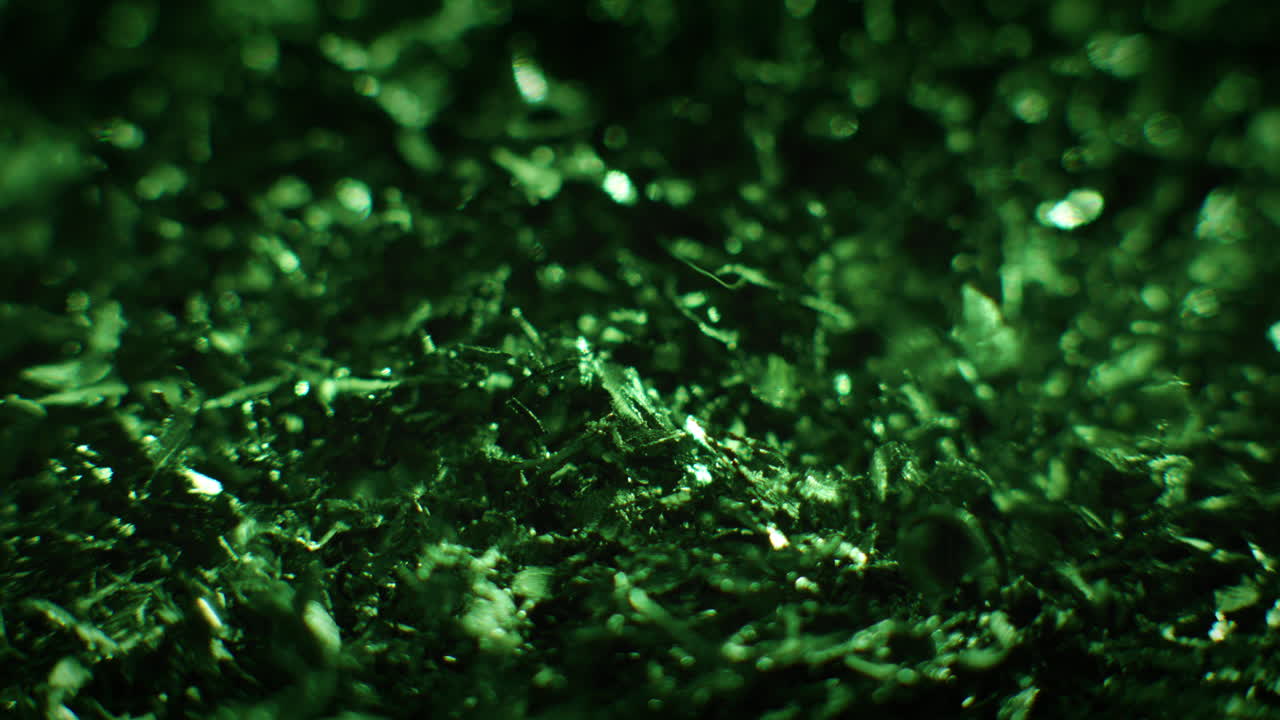 Emerald color metal fillings close-up shot