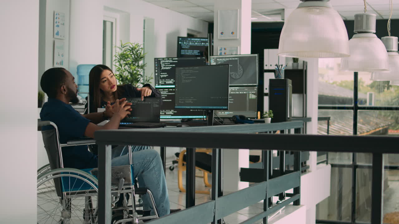 African american developer with impairment using computer to write code