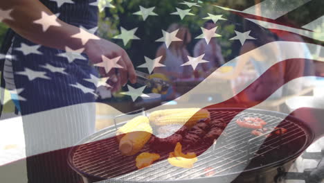 friends having barbecue in a picnic and the american flag